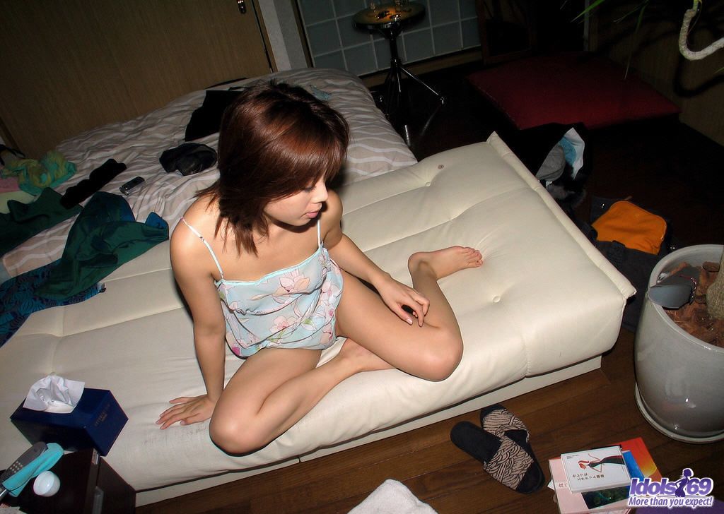 Japanese teen Tomomi gets completely naked after arriving at her residence