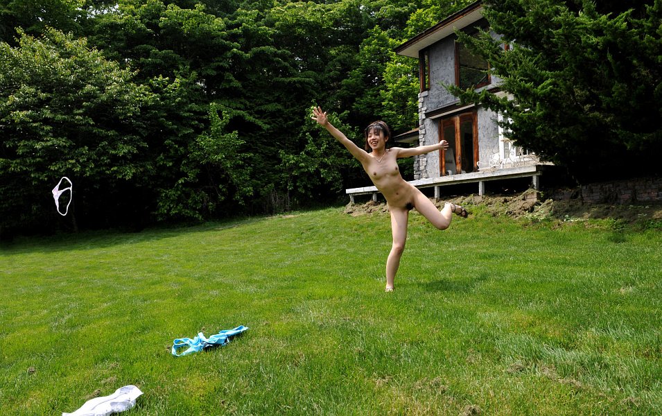 Cute Japanese teen Youzn runs around a backyard in the nude porn photo #424616741