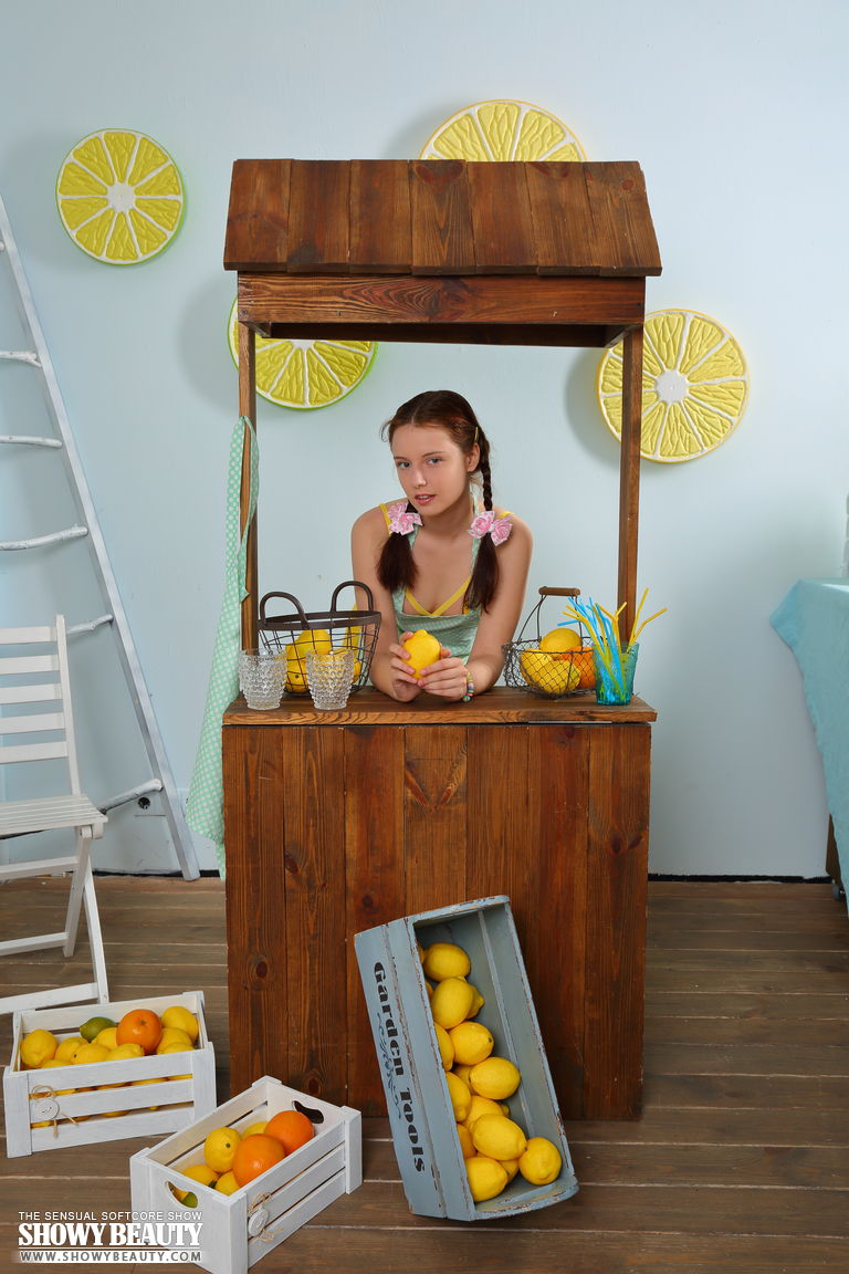 Young redhead Kim strips naked at her lemonade stand to drum up business porn photo #424326499