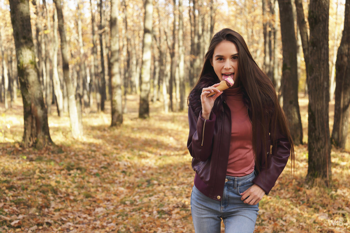 Nice Russian girl Leona Mia eats an ice cream treat in a forest while clothed porno foto #425268133