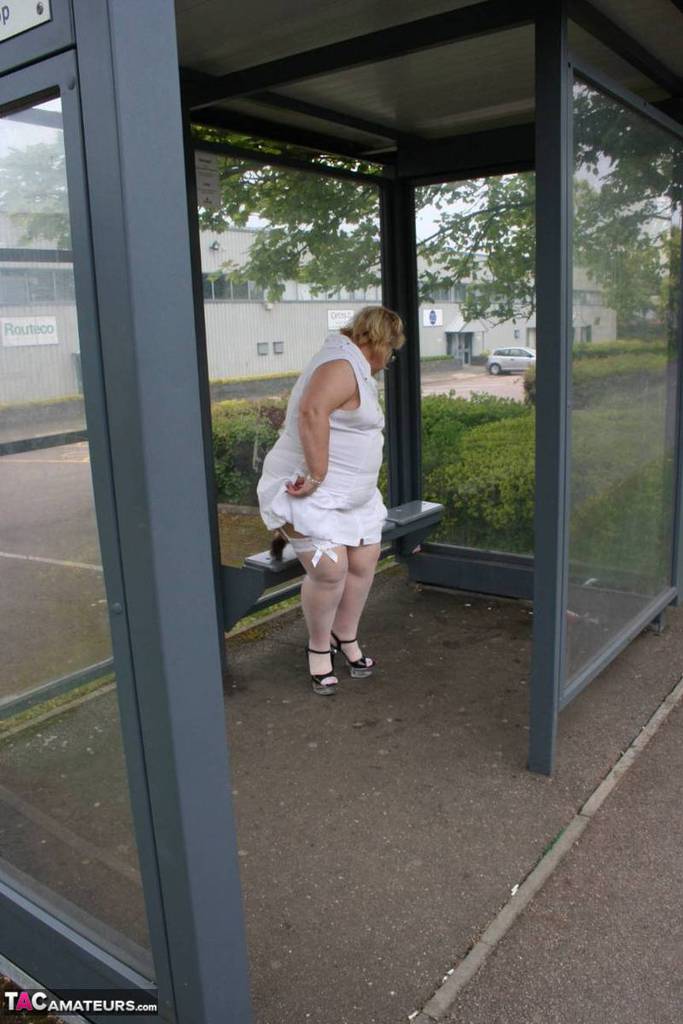 Fat blonde woman Lexie Cummings exposes herself in a public bus shelter porn photo #425336926