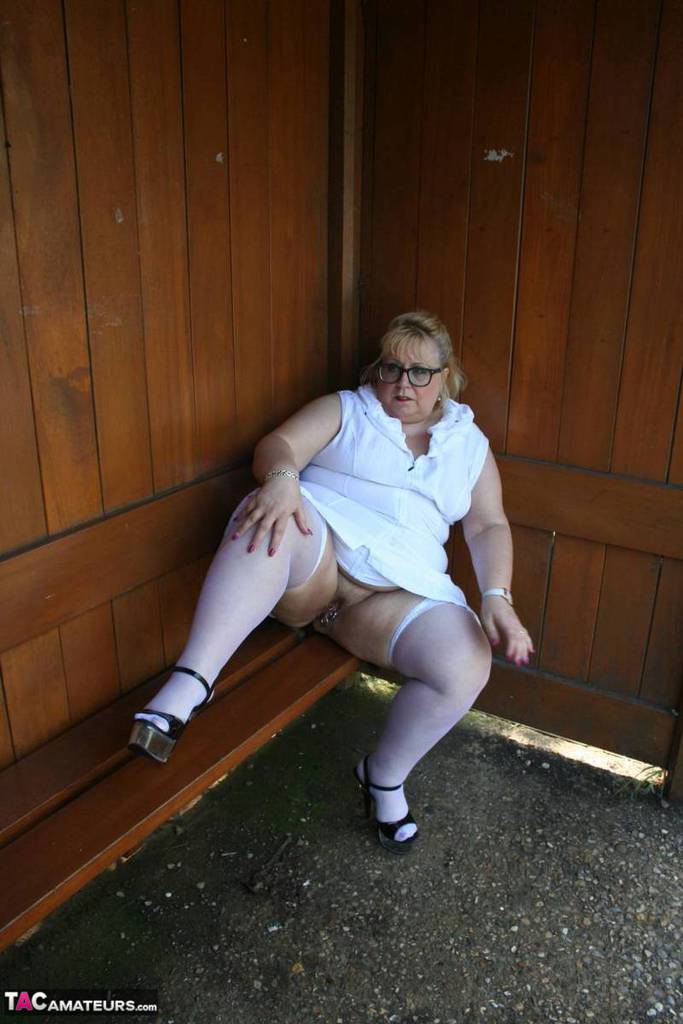 Fat blonde woman Lexie Cummings exposes herself in a public bus shelter porn photo #425336928