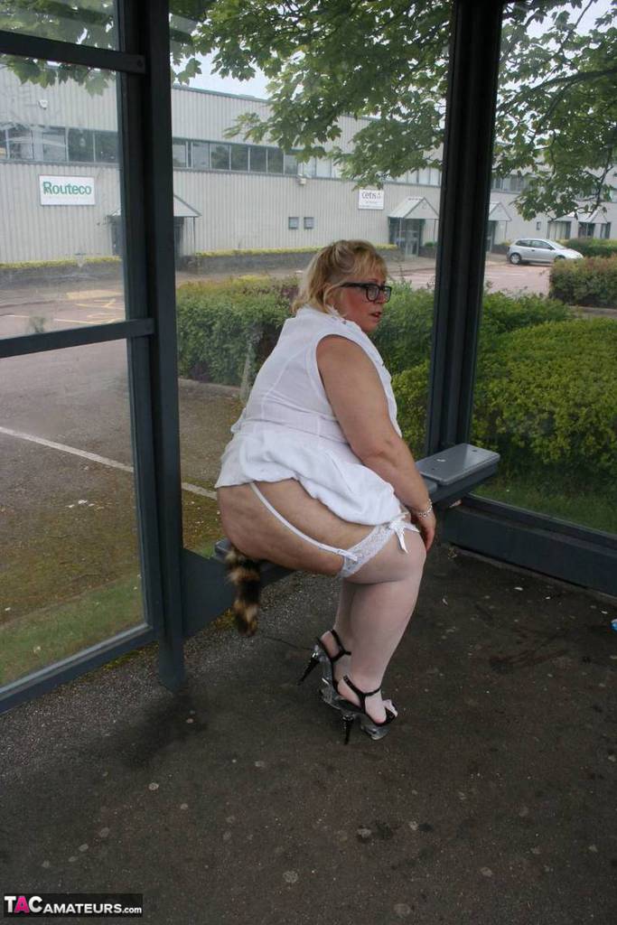 Fat blonde woman Lexie Cummings exposes herself in a public bus shelter porn photo #424758906