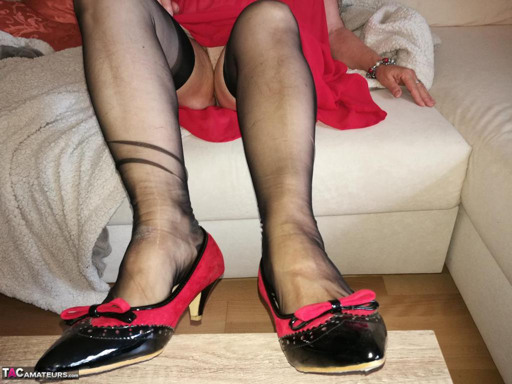 Naughty Granny Exposes Her Boobs While Changing Attire In Nylons And Heels