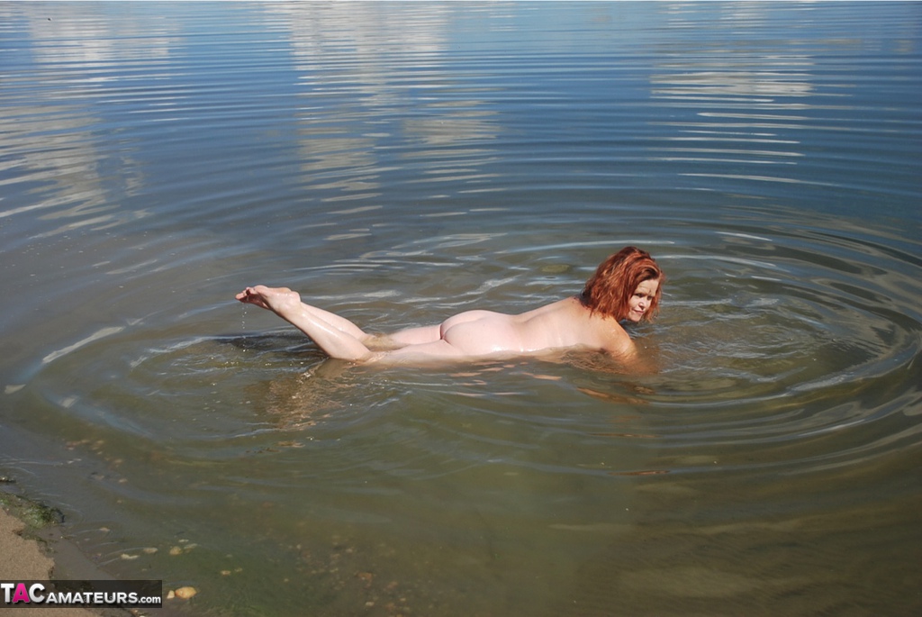 Redheaded amateur Misha covers her big tits in mud while in shallow water porn photo #425469058 | TAC Amateurs Pics, Misha, Beach, mobile porn