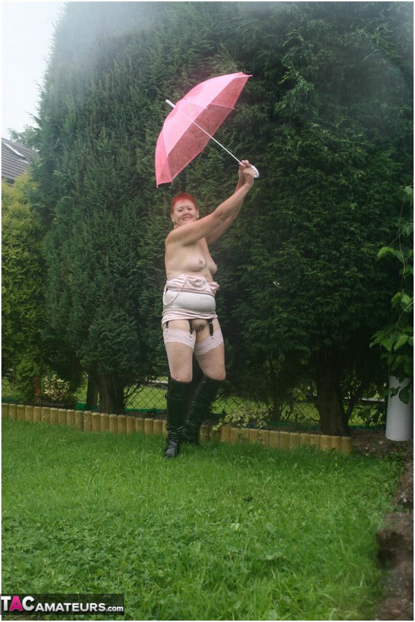 Older redhead Valgasmic Exposed models nude in the rain while holding a brolly photo porno #424895934 | TAC Amateurs Pics, Valgasmic Exposed, Saggy Tits, porno mobile