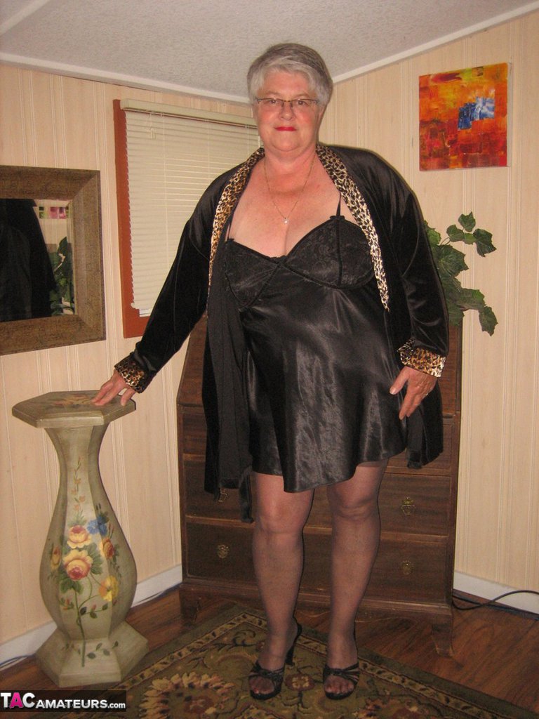 Fat old woman Girdle Goddess doffs black lingerie to pose nude in stockings foto porno #424128583