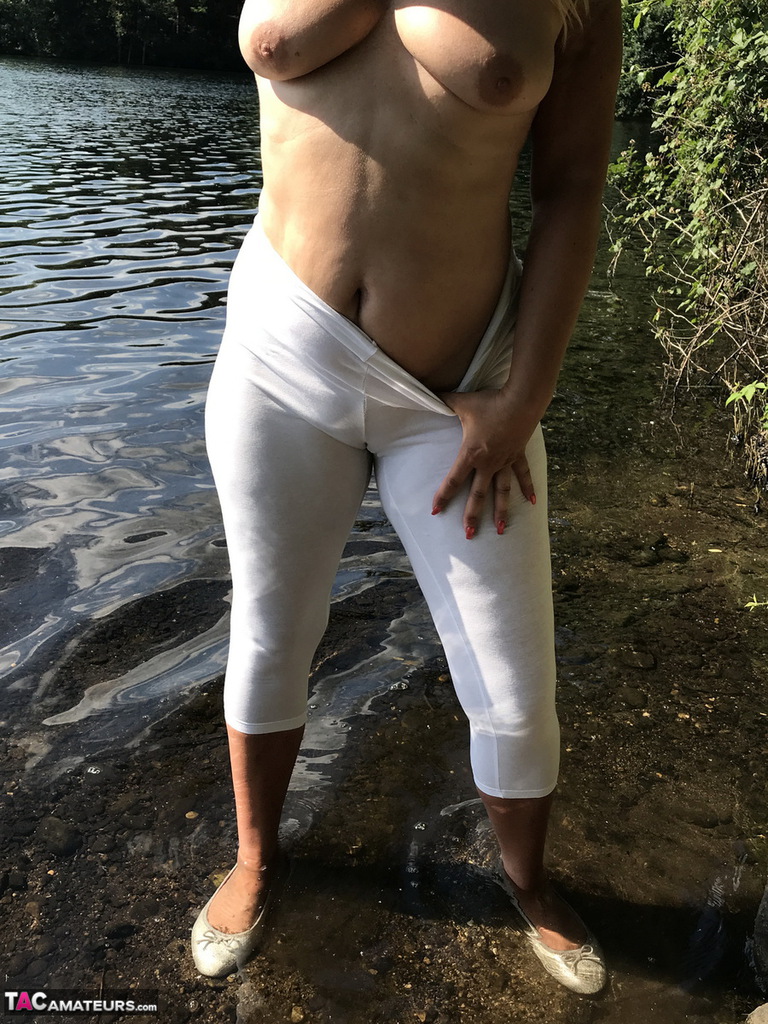 Middle Aged Blonde Sweet Susi Displays Her Tits At The Lake In Wet Pantyhose