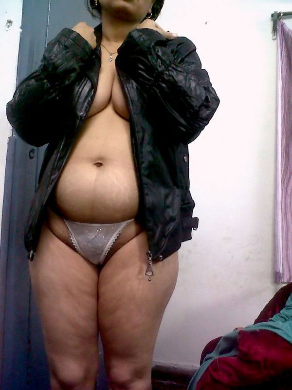 Fat Indian Woman Hides Her Face While Adorned In A Bra And Thong