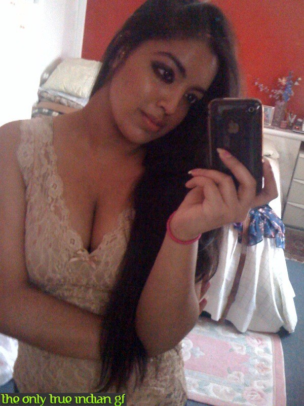 Busty Indian girl with long hair changes her bras during self shots porn photo #428565066