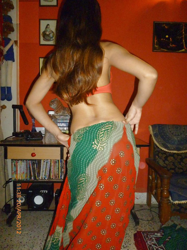 Indian solo girl slides upskirt panties aside before showing her bare breasts photo porno #425110279