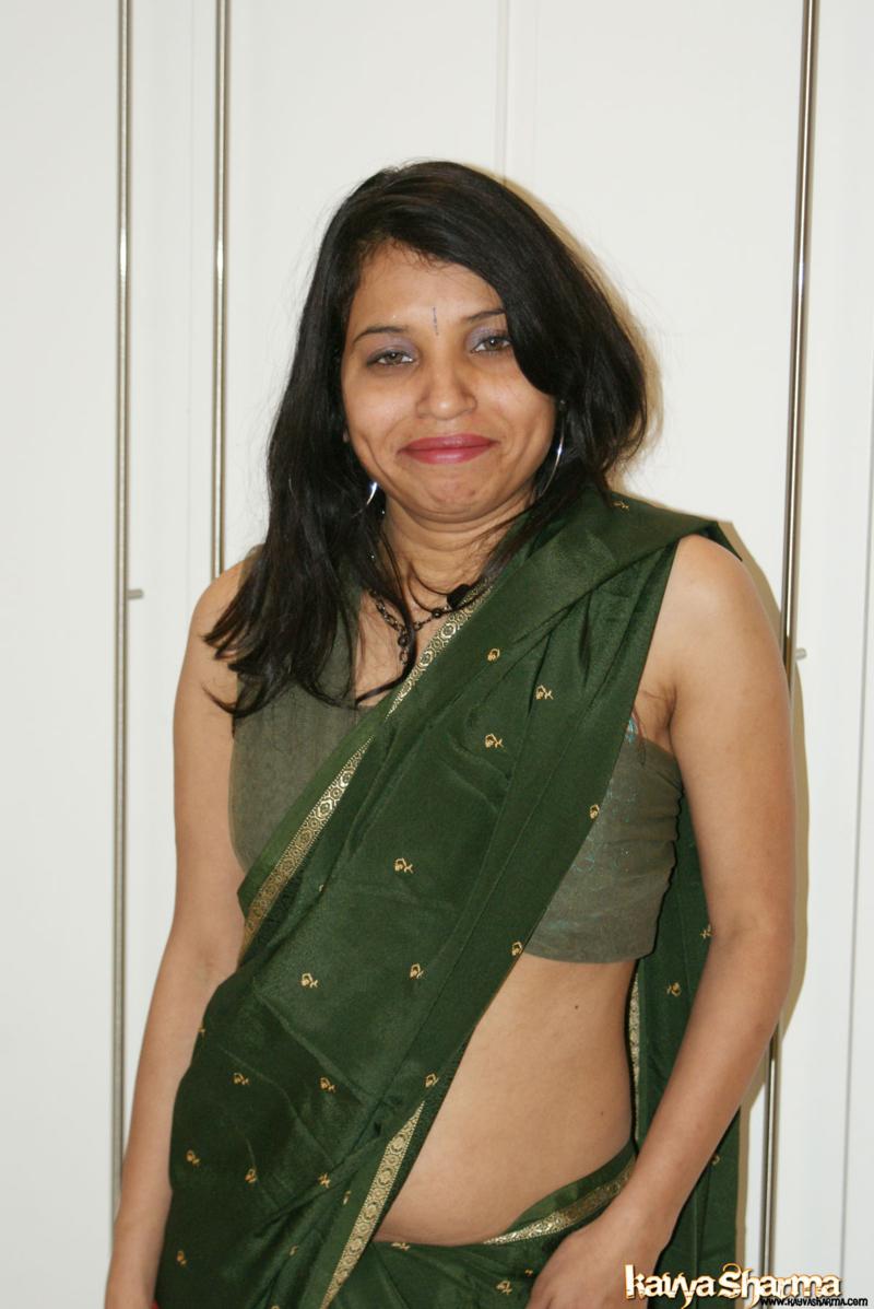 Kavya sharma in her sexy green indian sari showing off porn photo #425119779