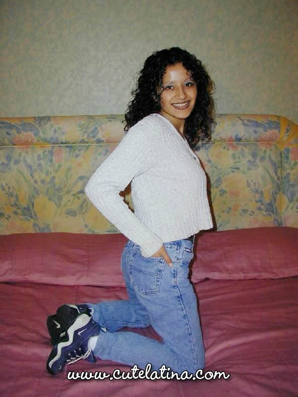 Latina girl with curly hair shows her bare ass on top of a bed foto porno #425220198
