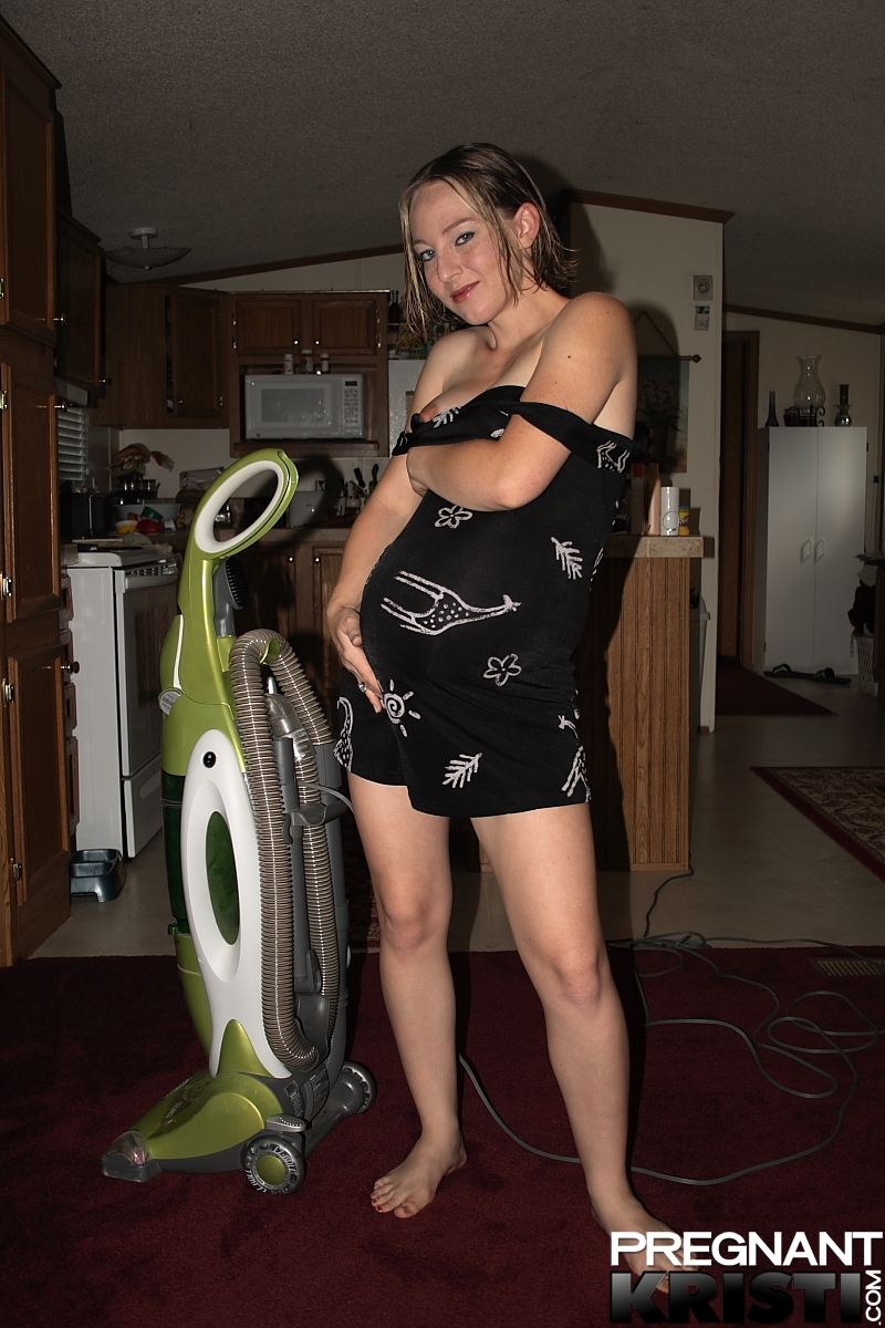 Pregnant amateur takes a vacuum cleaner attachment to her horny pussy foto porno #423355424