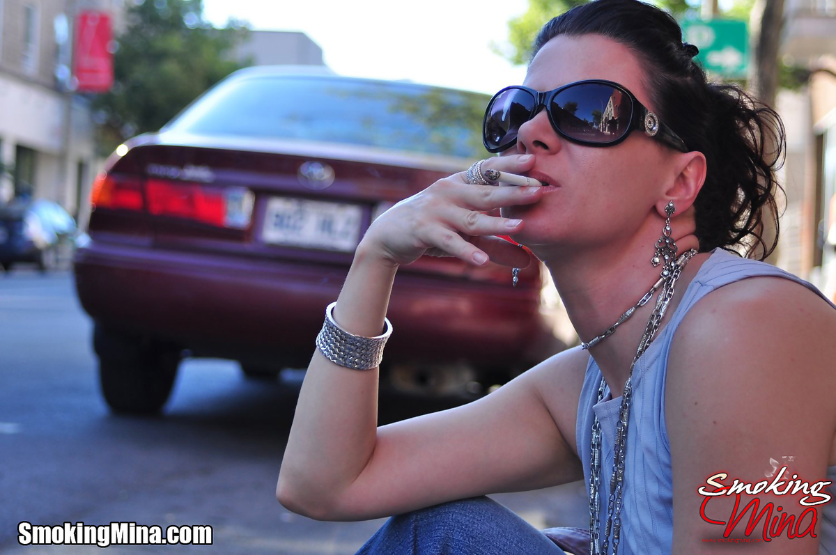 Brunette chick smokes a cigarette on a busy street while fully clothed foto porno #424141473 | Smoking Mina Pics, Smoking, porno móvil