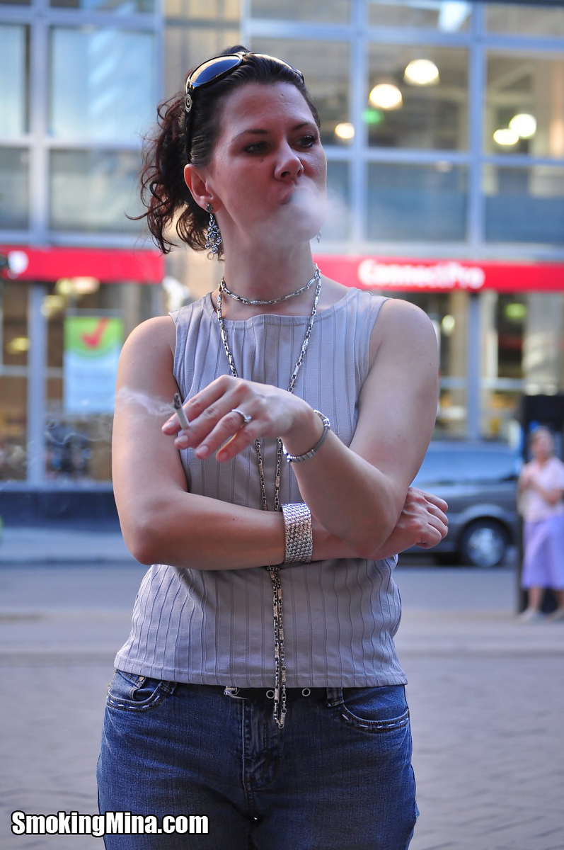 Brunette chick smokes a cigarette on a busy street while fully clothed foto porno #424141496 | Smoking Mina Pics, Smoking, porno móvil