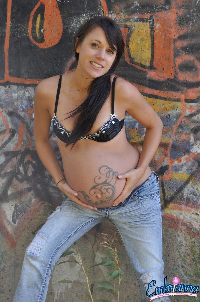 Pregnant solo girl Brianna shows her small tits and belly bump in faded jeans foto porno #424817385