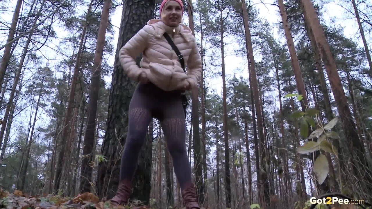 Blonde girl Anya pulls down her pants for an urgent piss while in a forest foto porno #426317024