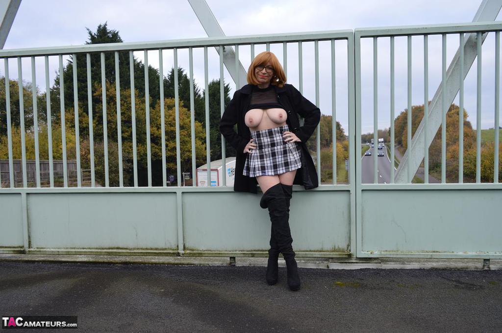 Mature redhead Barby Slut exposes herself in public while wearing OTK boots foto porno #424943639