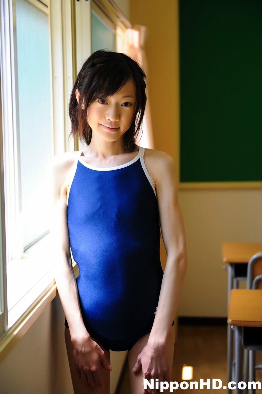 Tiny Japanese girl model non nude in a swimsuit on school desk foto porno #424107438