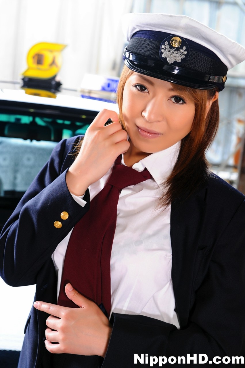 Female Japanese taxi driver unbuttons her blouse during upskirt action foto porno #425092702
