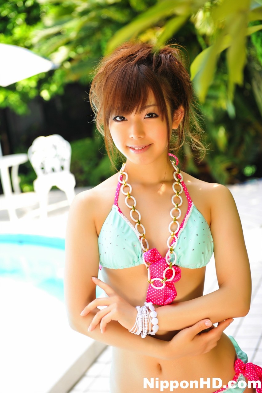 Adorable Japanese girl models a pretty bikini on a poolside patio foto pornográfica #424653445