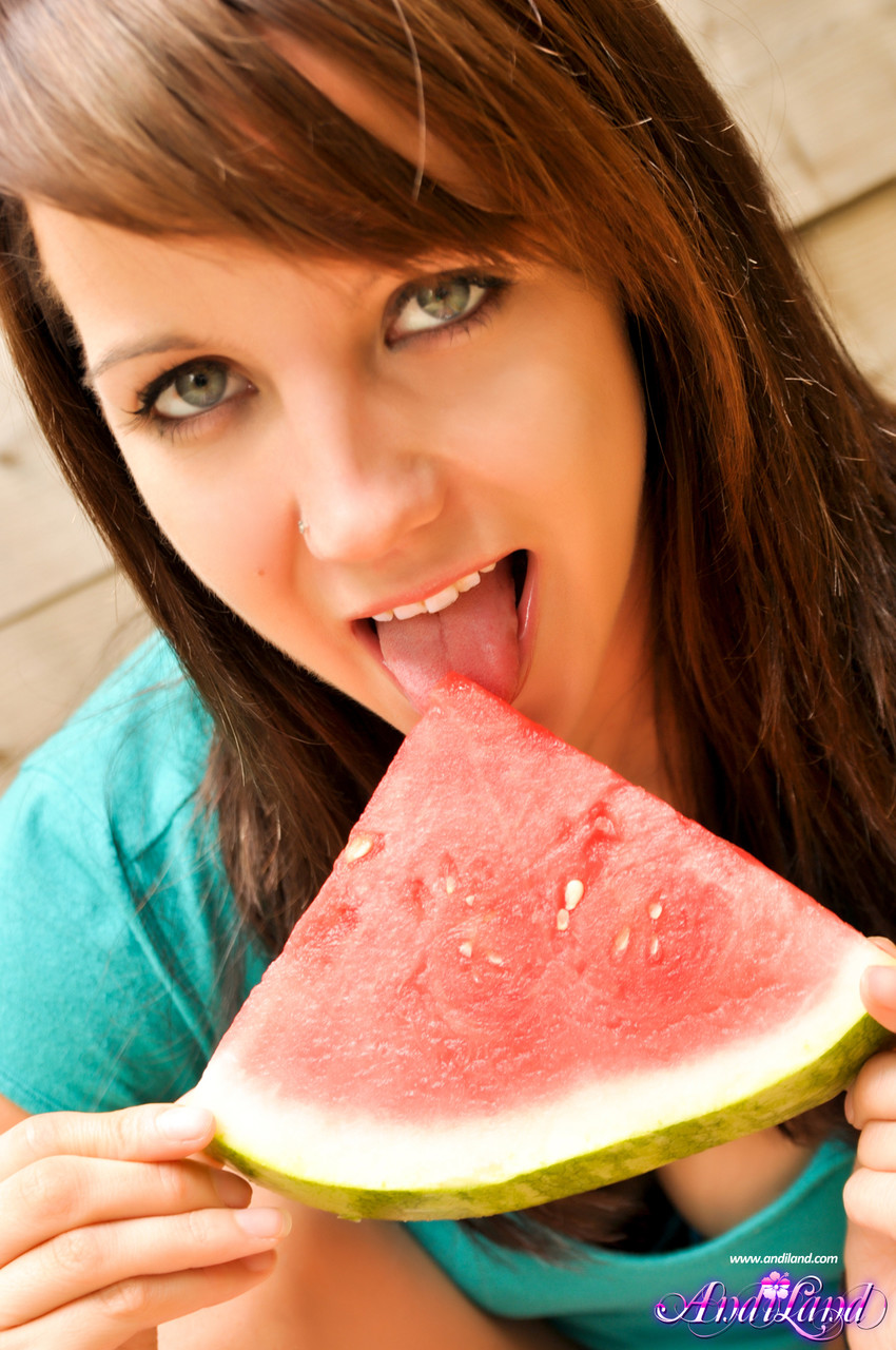 Sweet teen Andi Land eats watermelon in a tempting manner porno foto #422772183