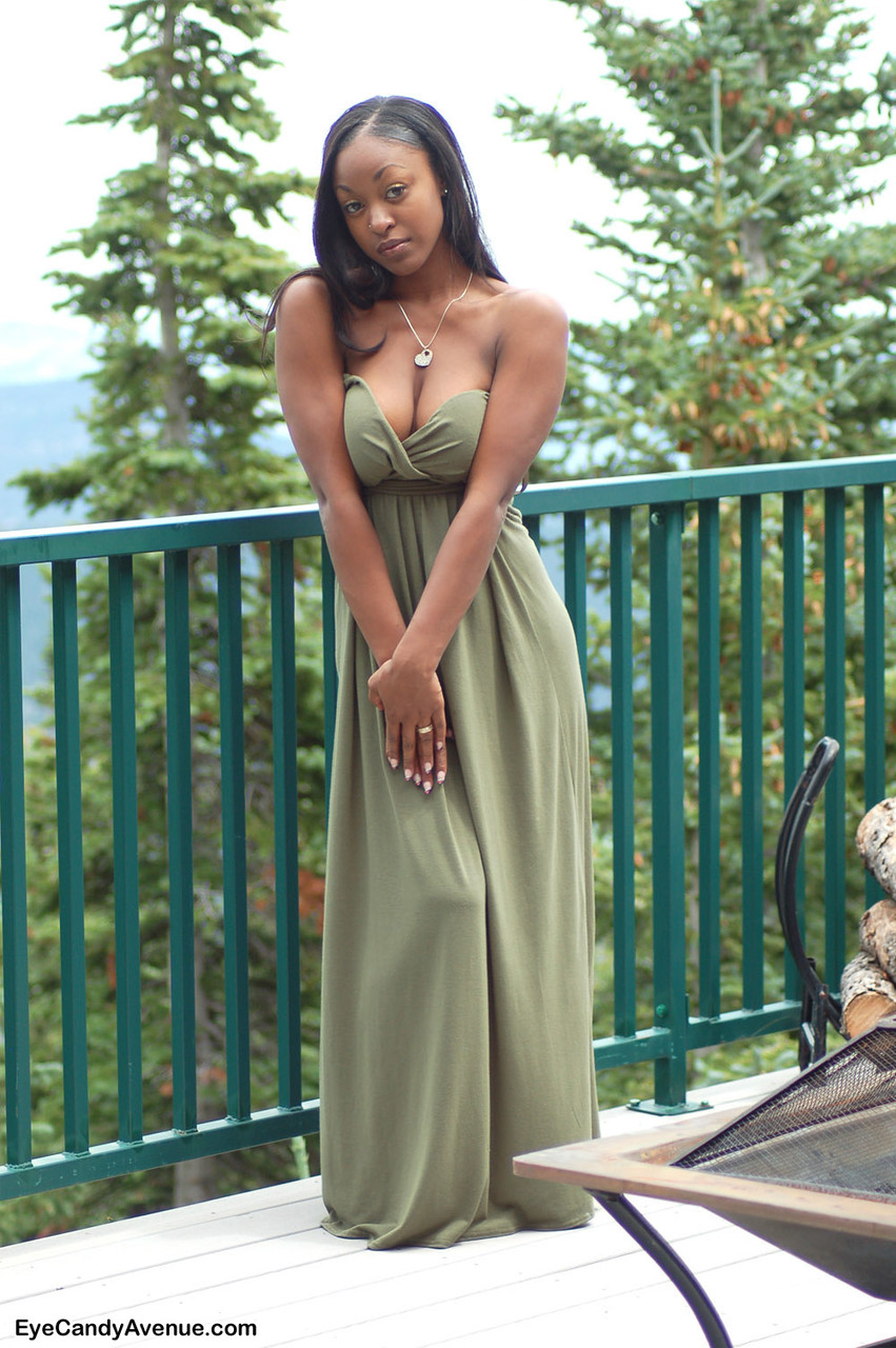 Ebony amateur Amber releases her big tits from a long dress on a balcony foto porno #424020729