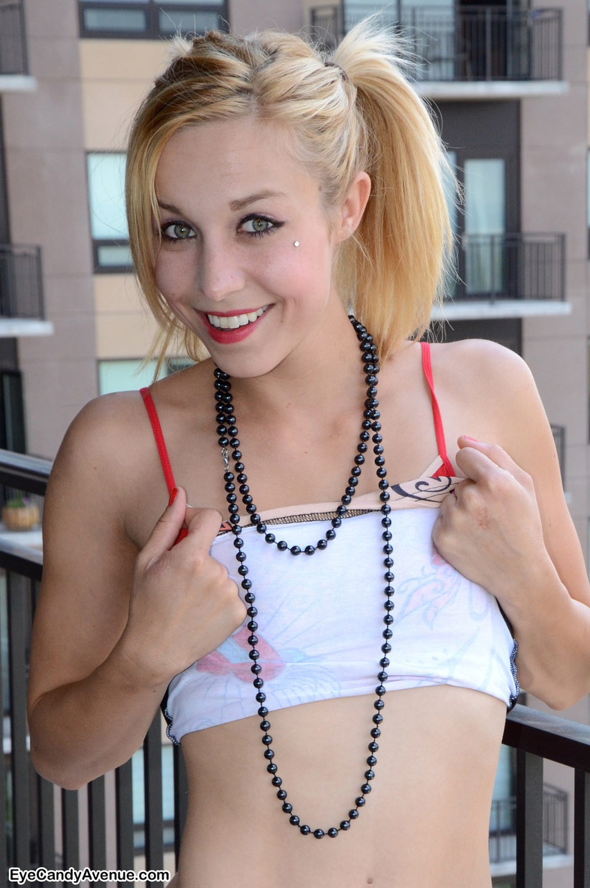 Cute blonde teen Marissa gets butt naked on a balcony in the city porno fotoğrafı #428210995