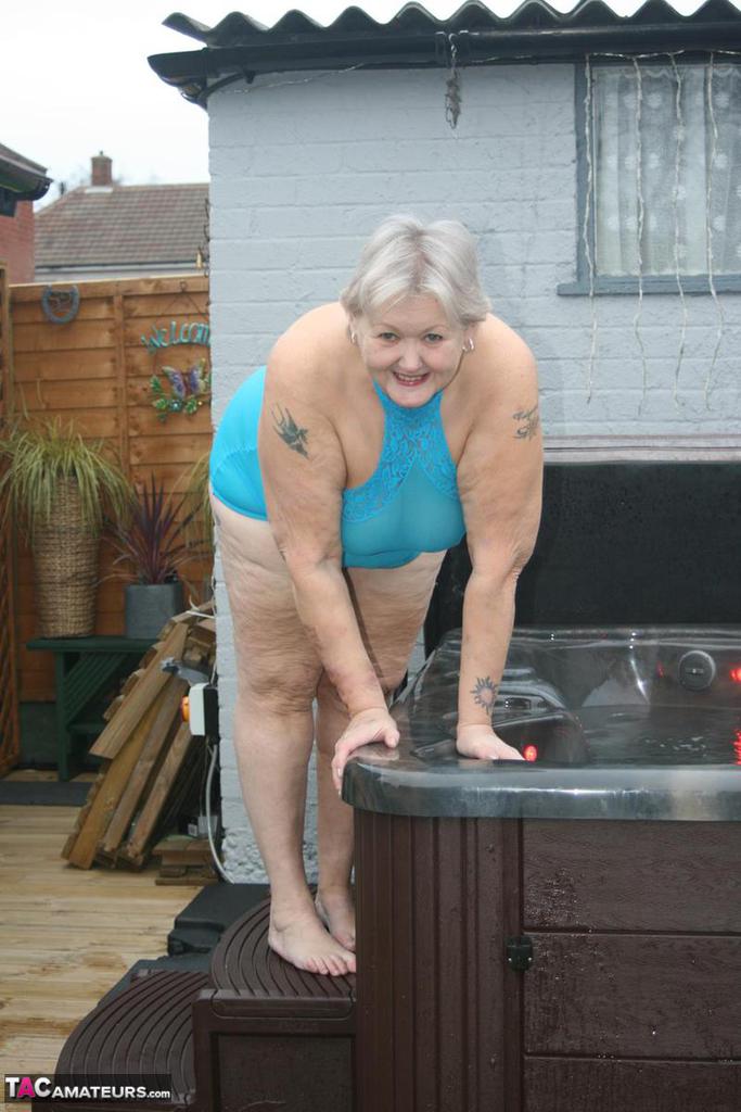 Old amateur frees tits and twat from tight dress before getting in hot tub zdjęcie porno #427332483 | TAC Amateurs Pics, Granny, mobilne porno