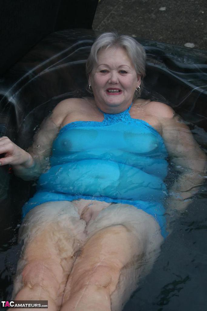 Old amateur frees tits and twat from tight dress before getting in hot tub porn photo #427332543 | TAC Amateurs Pics, Granny, mobile porn