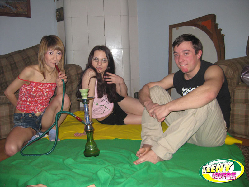 Young girls hit a water pipe before having a threesome with a boy foto porno #428951779