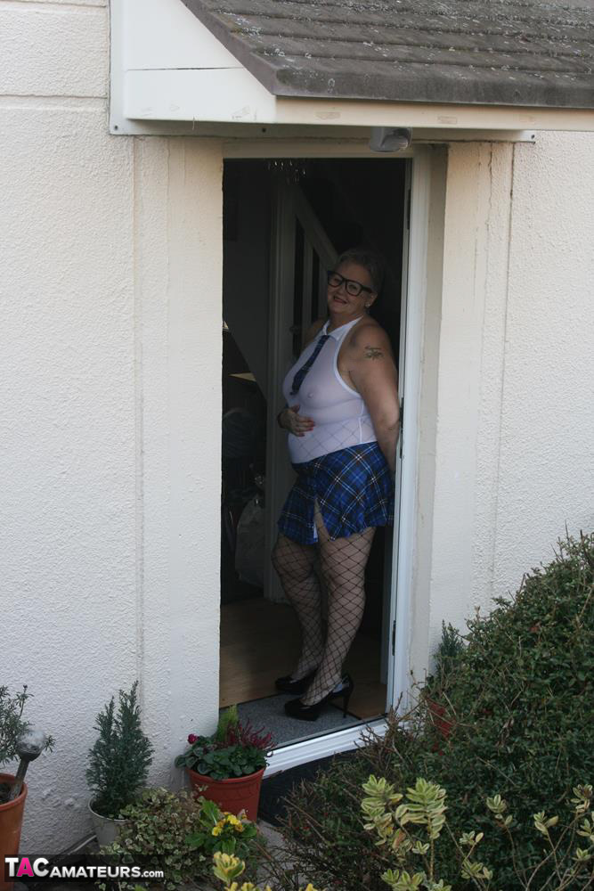 Fat granny Valgasmic Exposed steps outside in slutty schoolgirl clothing foto porno #424842297