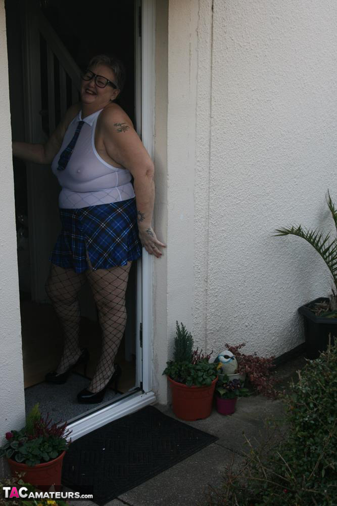 Fat granny Valgasmic Exposed steps outside in slutty schoolgirl clothing foto porno #424842301