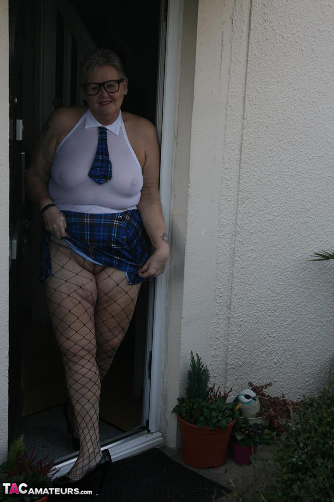 Fat granny Valgasmic Exposed steps outside in slutty schoolgirl clothing foto porno #424842307