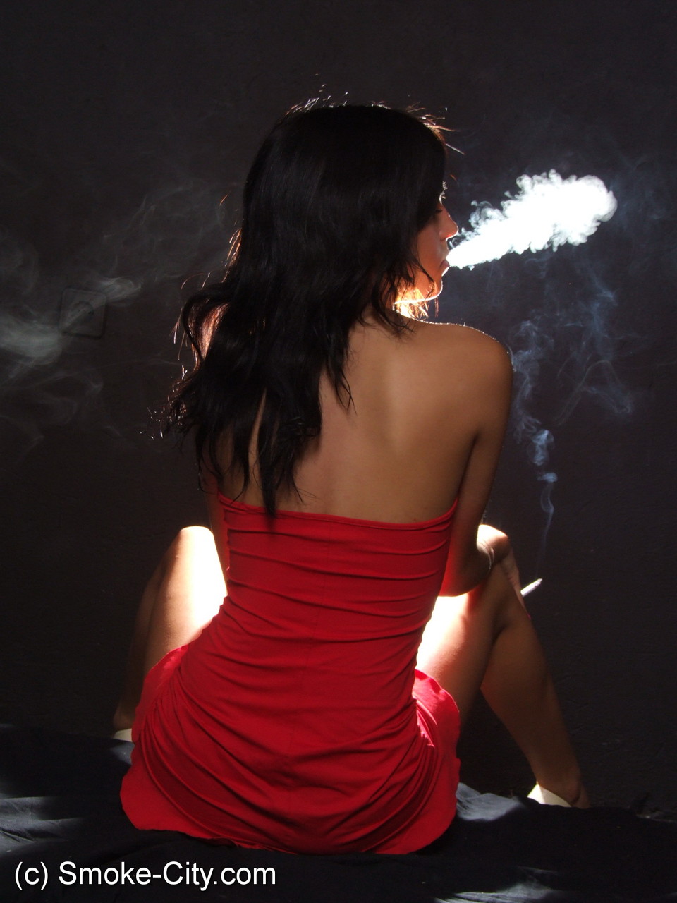 Young brunette shows her sleek legs while smoking in a red dress foto porno #425571309