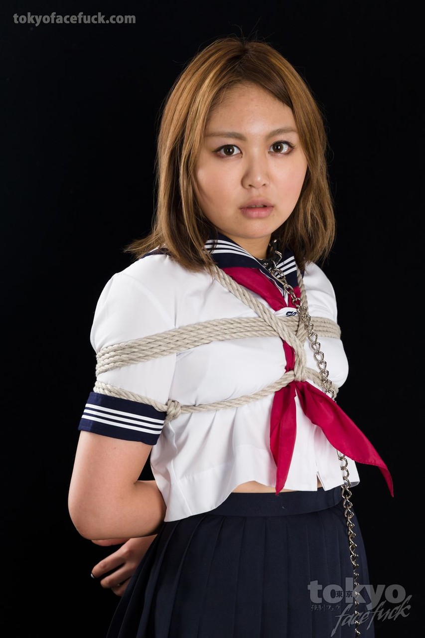 Japanese schoolgirl is forced to suck cock on her knees while rope bound porn photo #422963550
