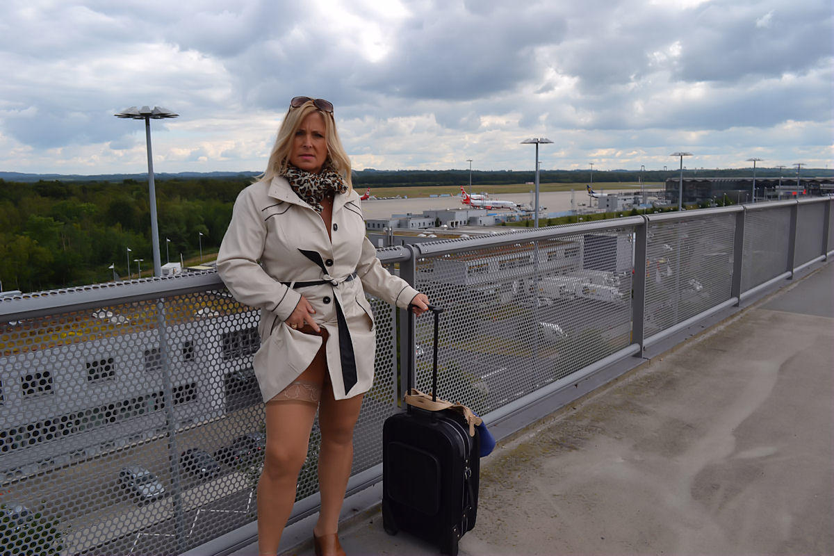Mature blonde exposes herself in a trench coat at the airport porn photo #428747571 | Hot Nudist Pics, Public, mobile porn