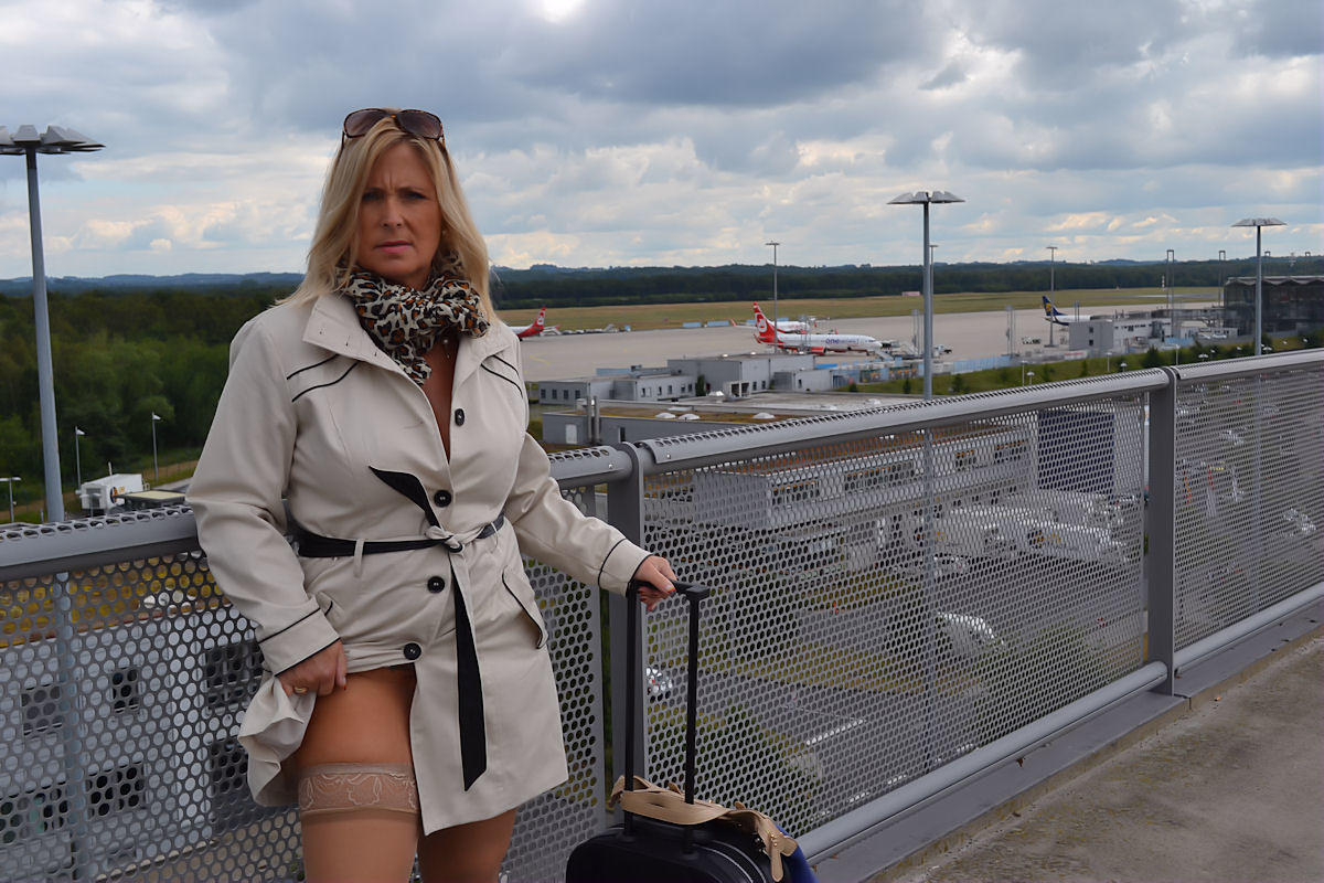 Mature blonde exposes herself in a trench coat at the airport porn photo #428747572 | Hot Nudist Pics, Public, mobile porn