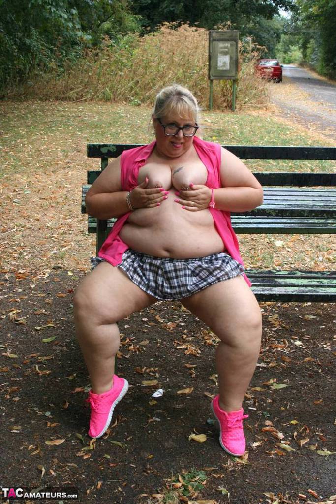 Obese British athlete Lexie Cummings bares herself on a public picnic table.