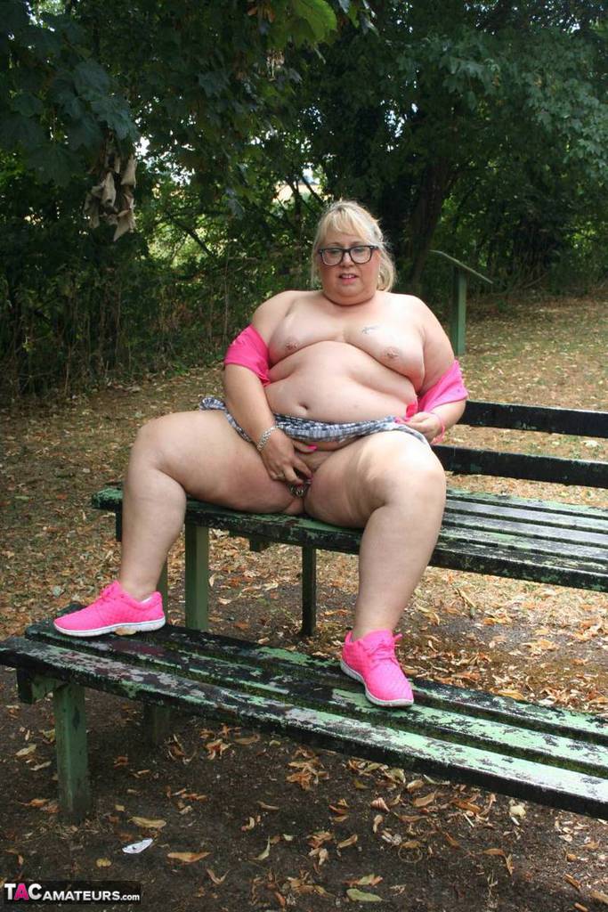 Self-imposed: Obesessed British amateur Lexie Cummings poses for pictures on a public picnic table.