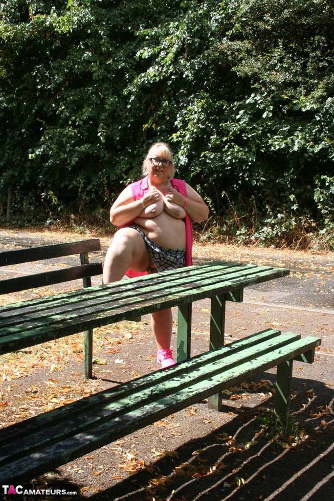 Announcement: Obesity: Lexie Cumming', an obsequious British amateur, strips naked on a public picnic table.