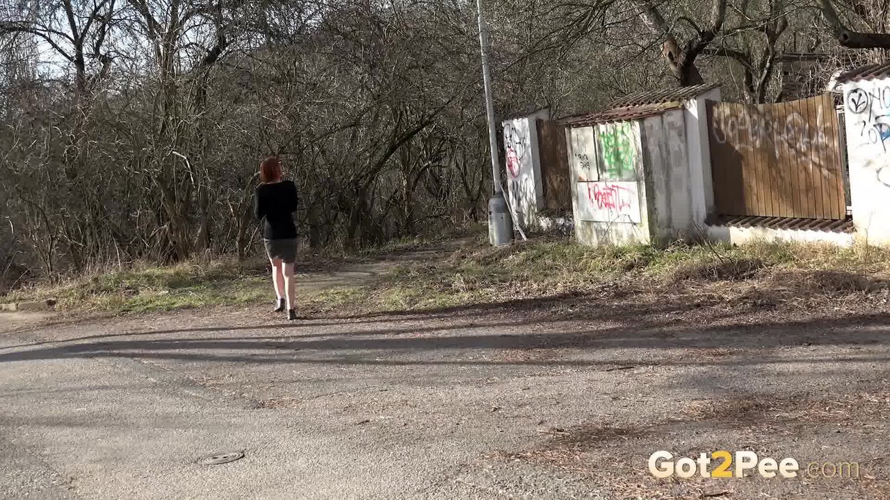 Gorgeous redhead pees in the middle of road foto porno #426381401