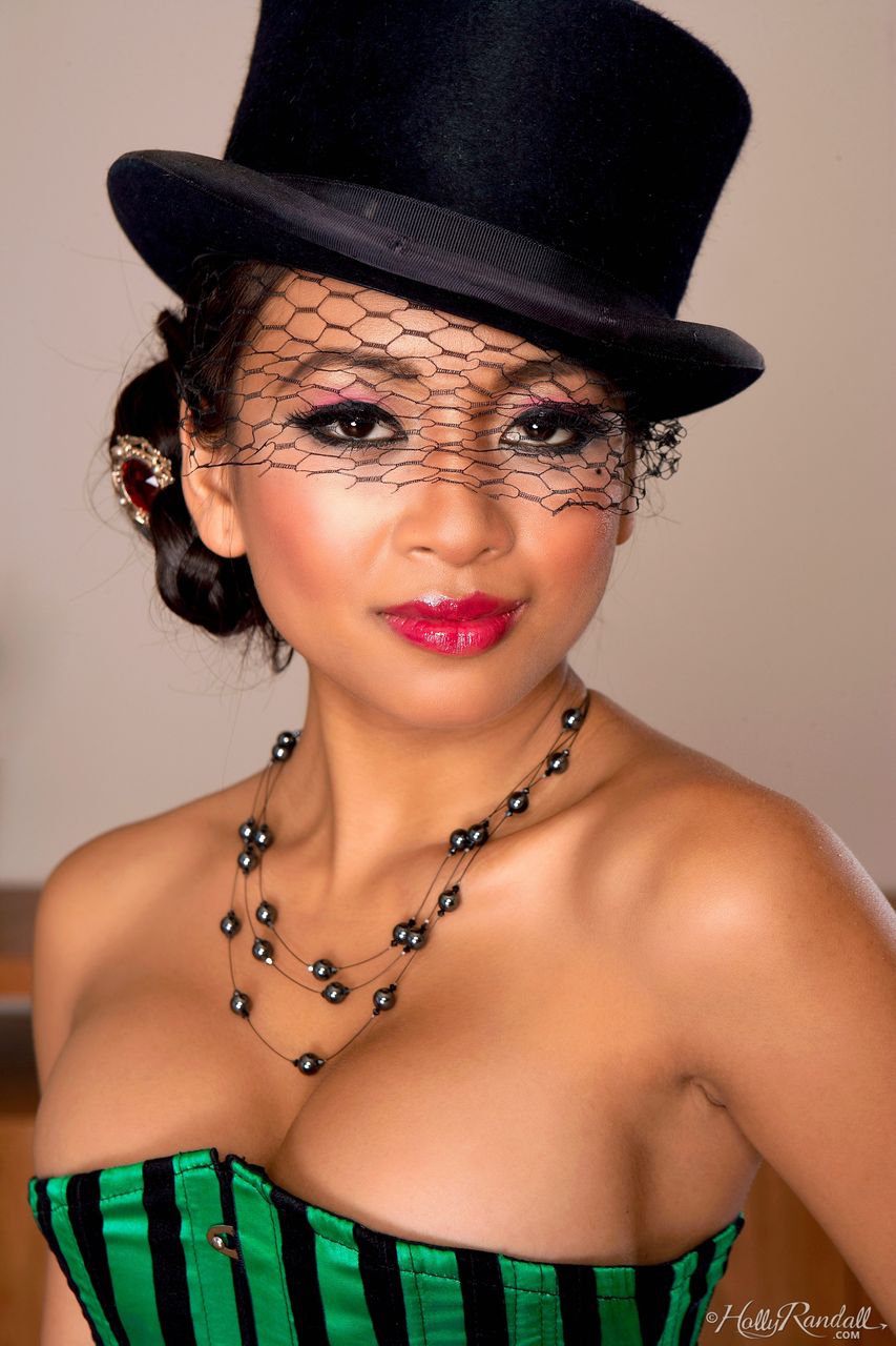 Asian centerfold model Kina Kai takes off a corset in a top hat and nylons foto porno #425795305