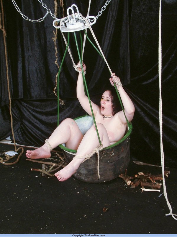 Overweight female sex slave is restrained in a basket during needle play porn photo #422628274