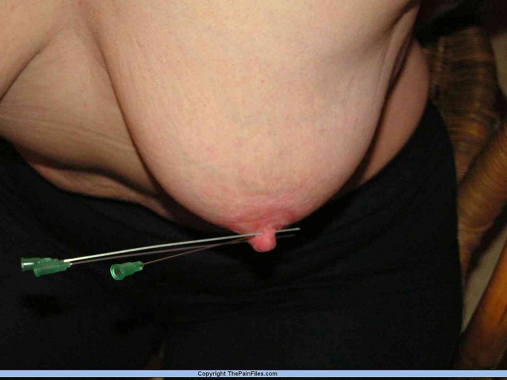 Restrained Blonde Lady Has Her Nipples Clamped And Pierced With Needles