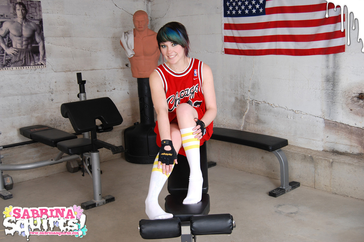 Amateur girl Sabrina Squirts takes a big pee on a weightlifting bench in socks porn photo #424151826