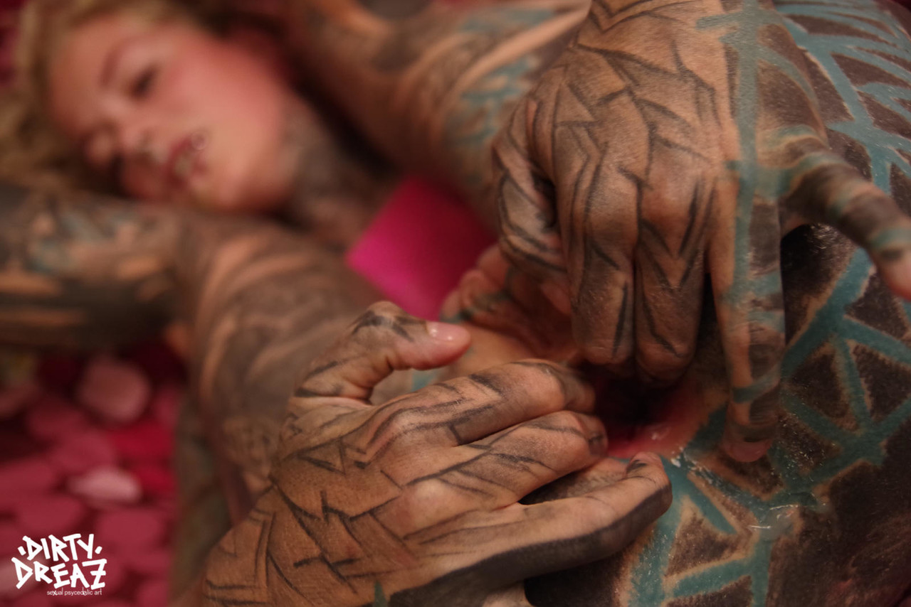 This is how a heavily tattooed woman puts her fingers in that asshole, stretching out like an angelic dream.