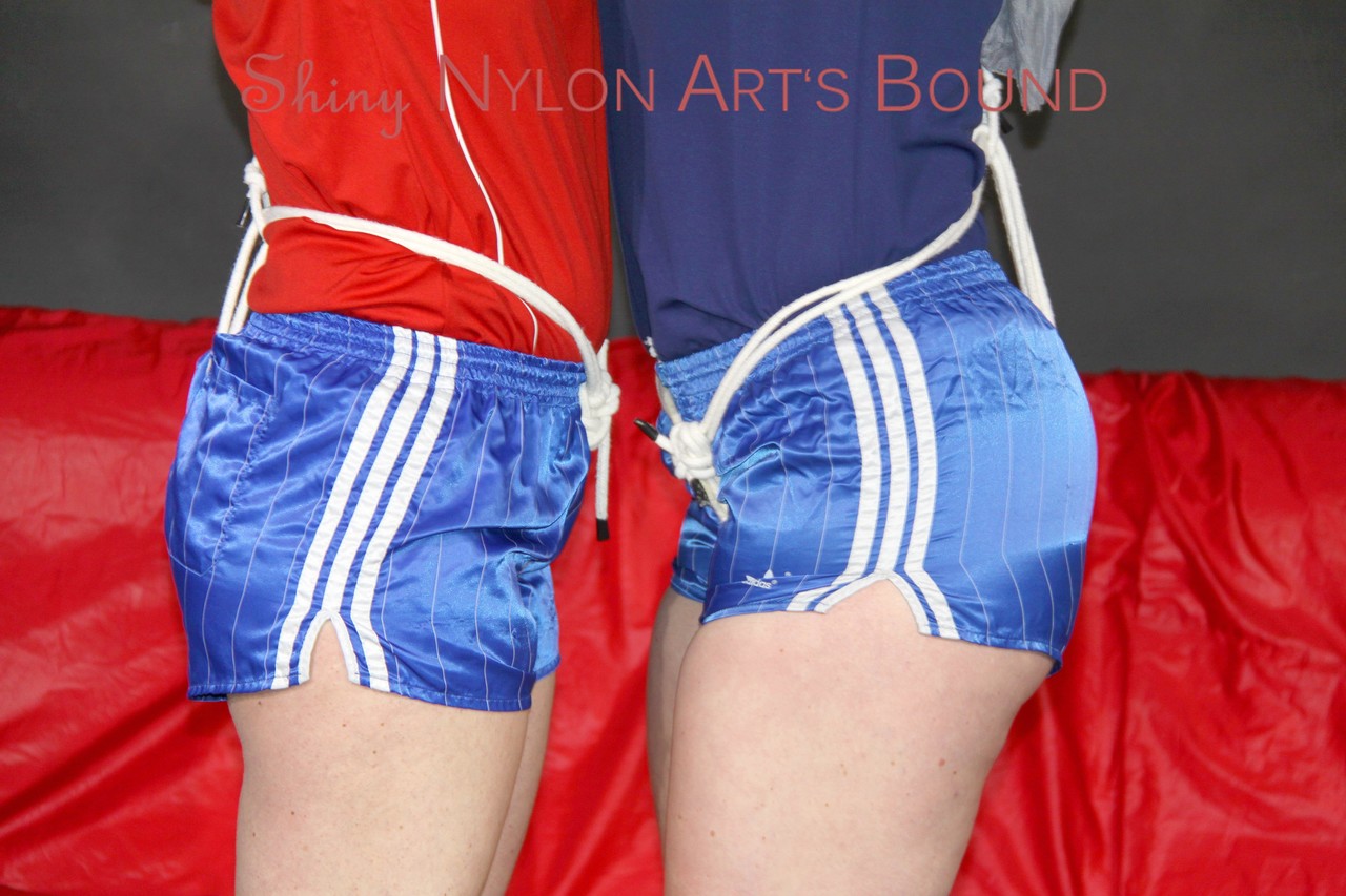 Jill and Sophie wearing sexy shiny nylon shorts and shirts tied and gagged foto porno #425439240