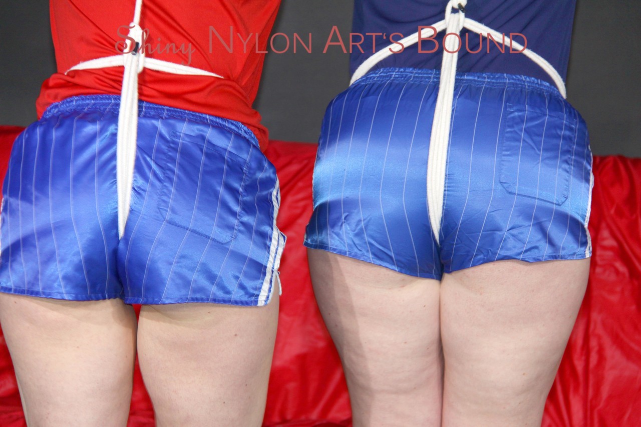 Jill and Sophie wearing sexy shiny nylon shorts and shirts tied and gagged foto porno #425439243